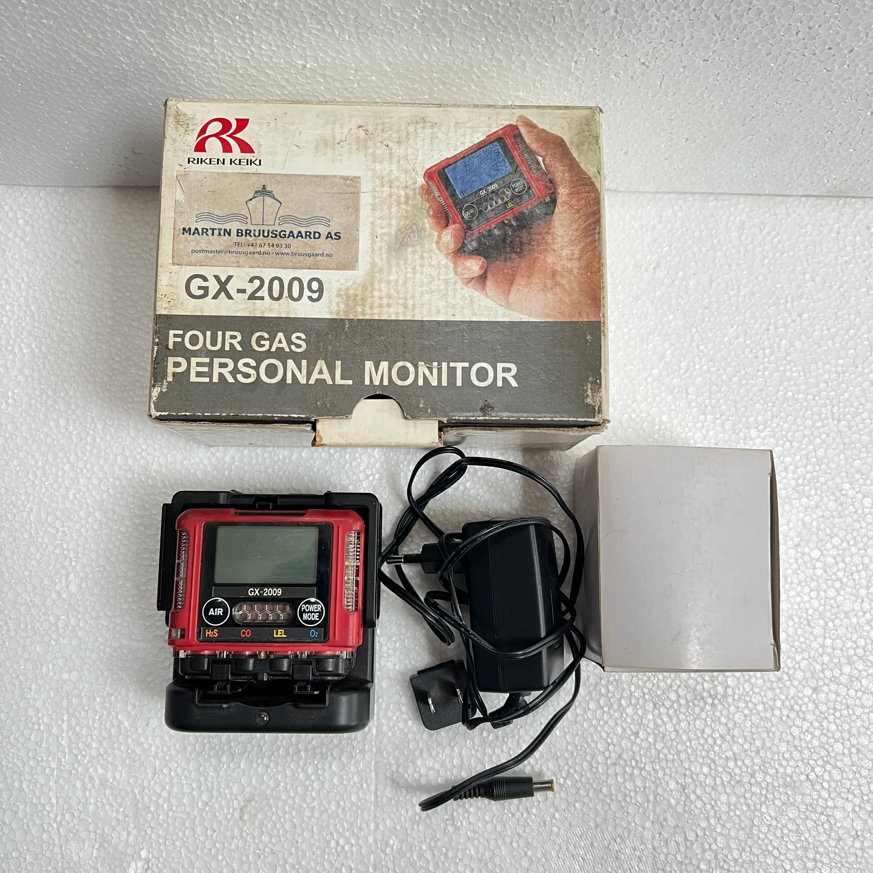 Riken Keiki GX-2009 portable gas monitor with charger