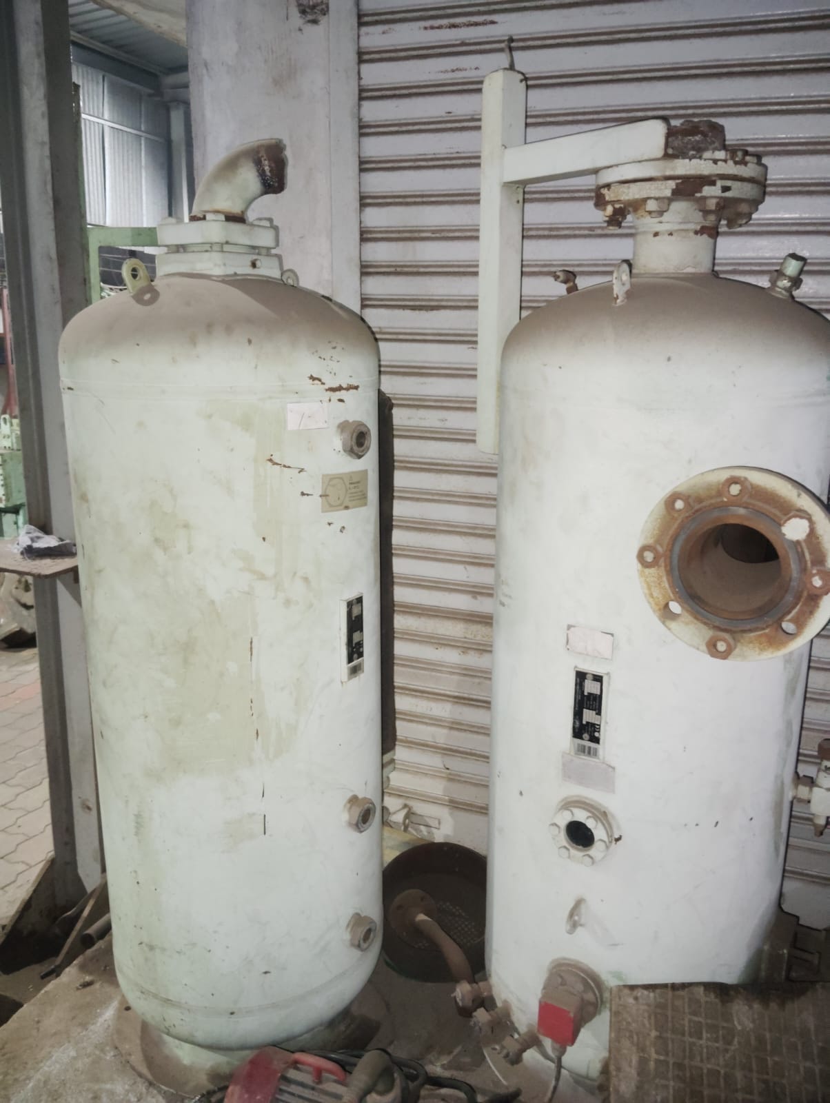 Industrial storage tanks with pipes