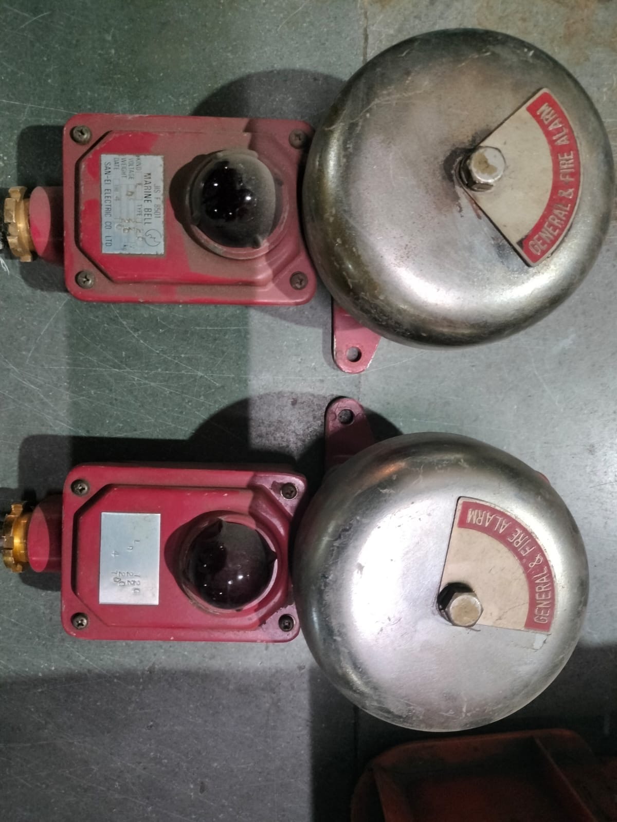 Industrial fire alarm bells with red housings