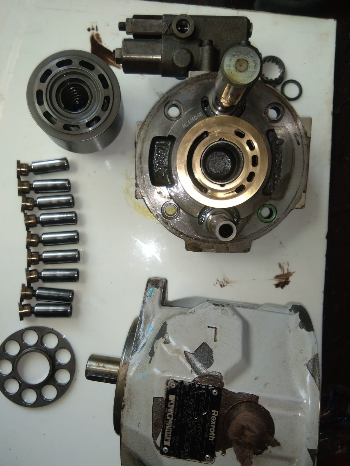 Disassembled Rexroth hydraulic pump components